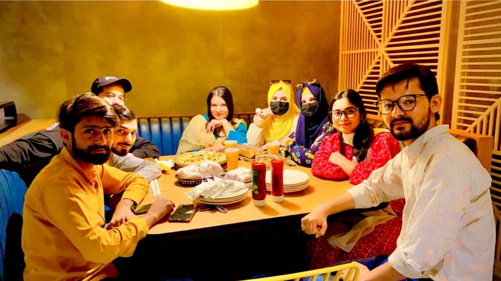 Amna Rashid with PlomX Tech Staff