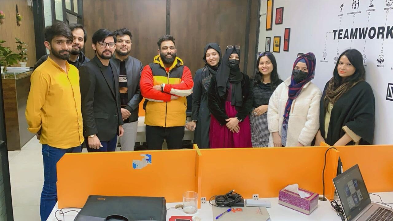 Amna Rashid With The PlomX Staff